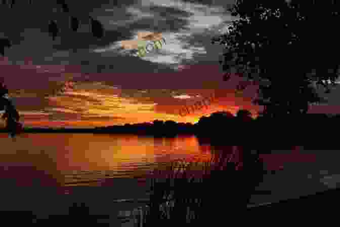 A Breathtaking Sunset Over A Tranquil Lake, Symbolizing The End Of Summer We Ll Always Have Summer (Summer 3)
