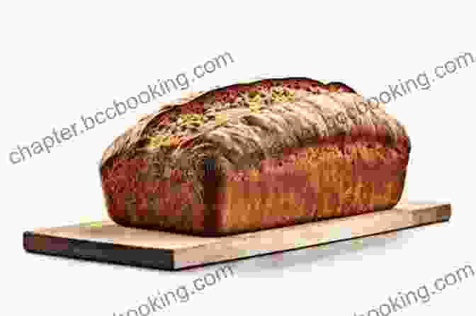 A Close Up Of A Golden Brown Loaf Of Bread With A Crispy Crust The Complete Baking Breads For Family: A Step By Step Guide To Achieving Bakery Quality Results