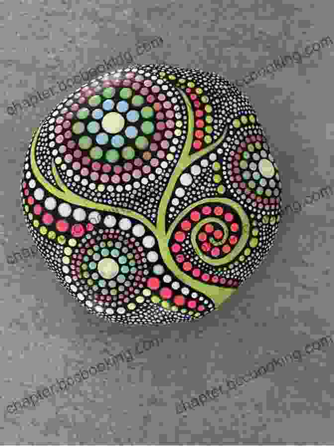 A Rock Being Painted Using The Dotting Technique, Showing Intricate Patterns And Designs. The Art Of Rock Painting: Techniques Projects And Ideas For Everyone