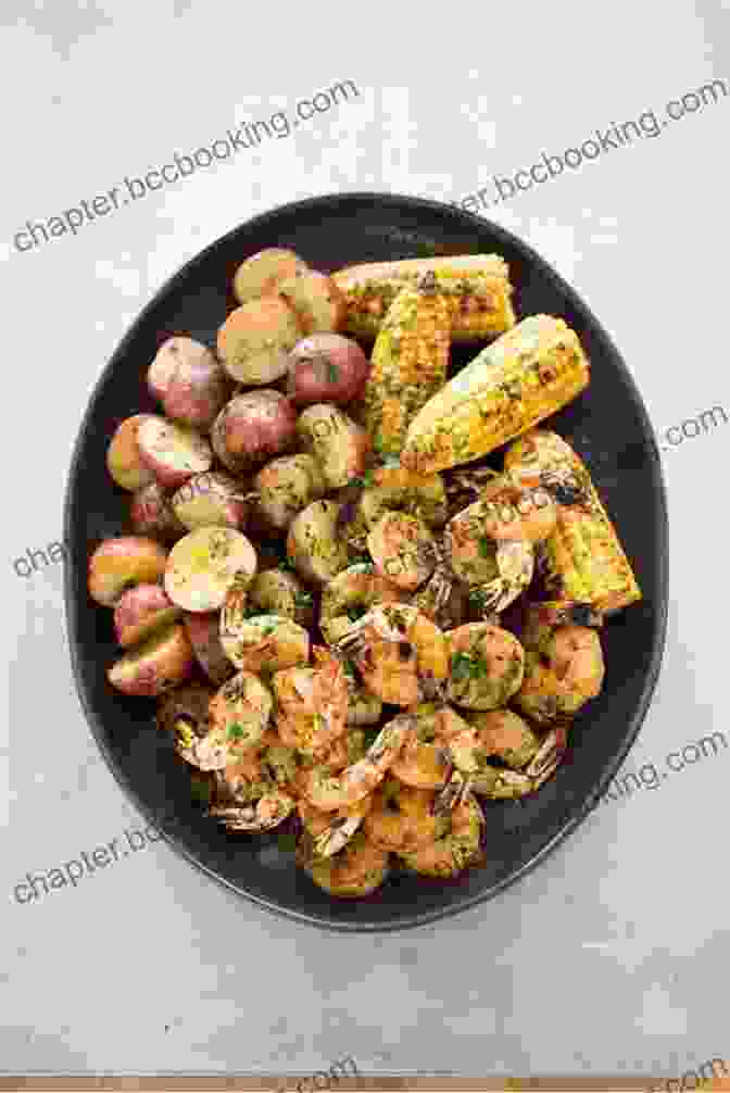 A Steaming Bowl Of Grilled Shrimp, Corn On The Cob, And Potatoes, Showcasing The Freshness And Flavors Of Southern Cuisine Southern Living Off The Eaten Path: Favorite Southern Dives And 150 Recipes That Made Them Famous (Southern Living (Paperback Oxmoor))