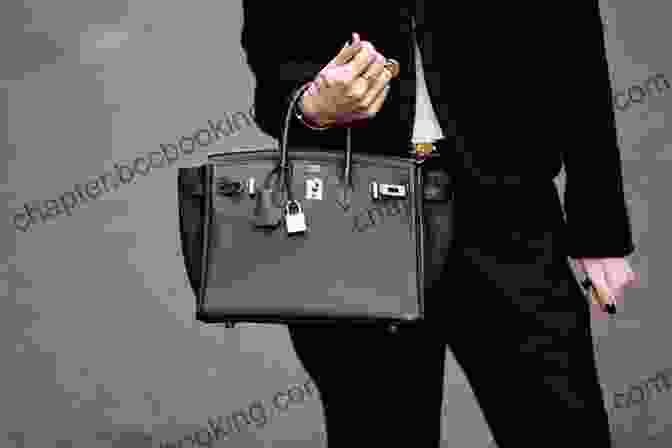 A Woman Carrying A Black Birkin Bag Bringing Home The Birkin: My Life In Hot Pursuit Of The World S Most Coveted Handbag
